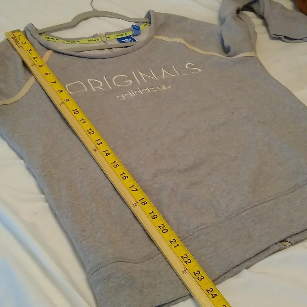 Original Adidas Women's size medium sweatshirt. Comfy and Cozy